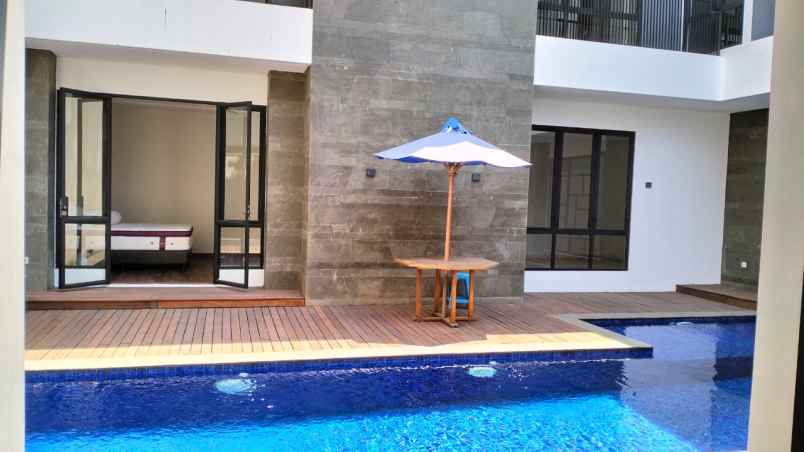 dijual rumah emerald cove summarecon