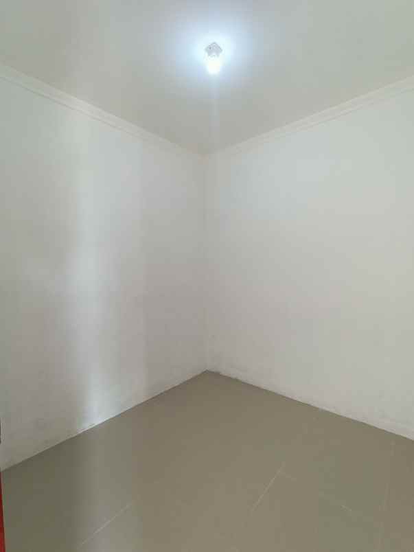 dijual rumah jalan haji kimah