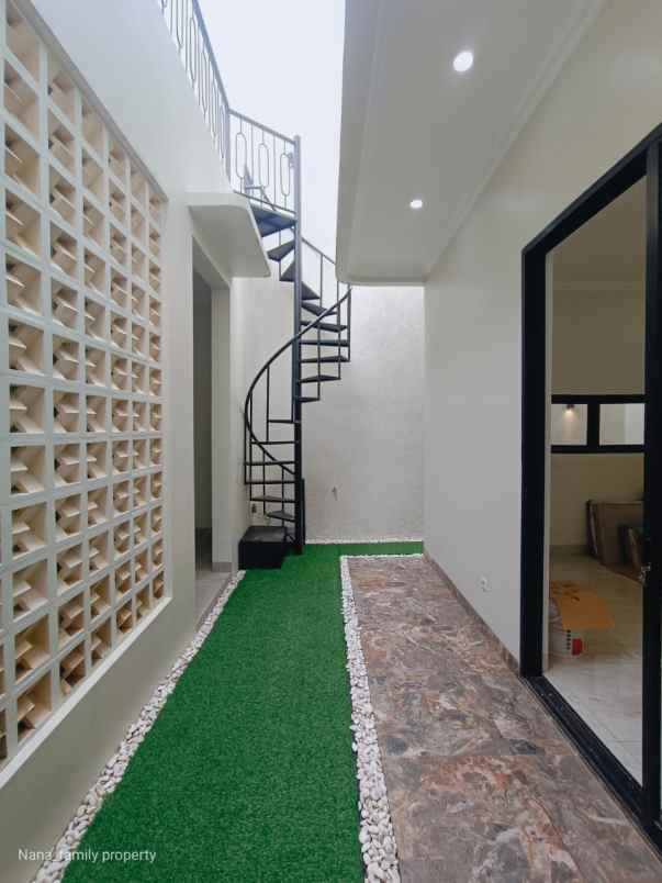 dijual rumah jalan raya kelapa dua