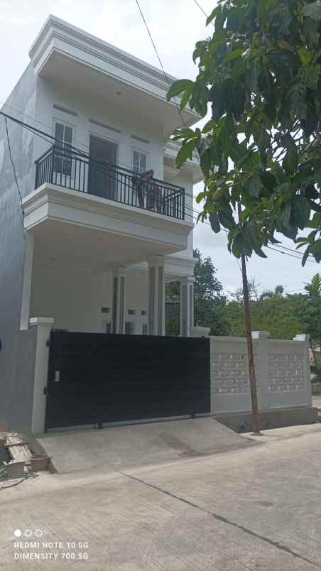 dijual rumah jl raya jatiwaringin