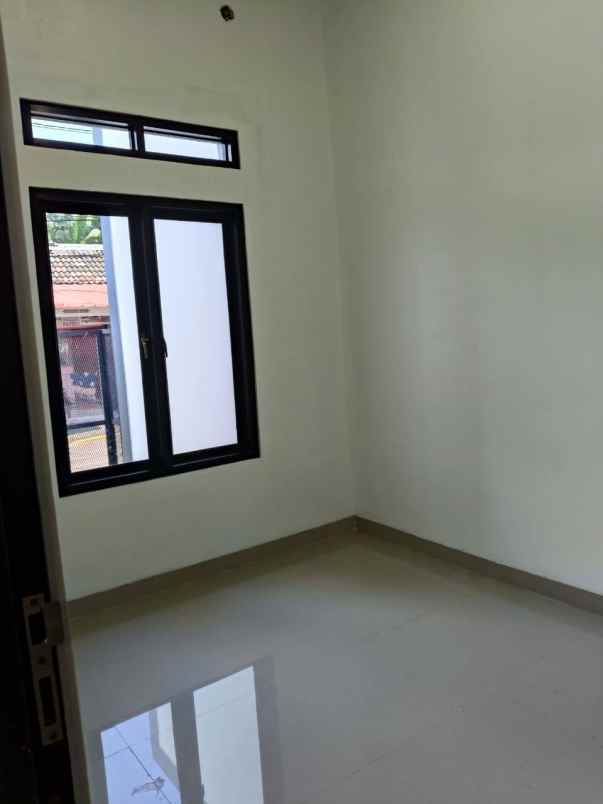 dijual rumah perum pesona anggrek bekasi