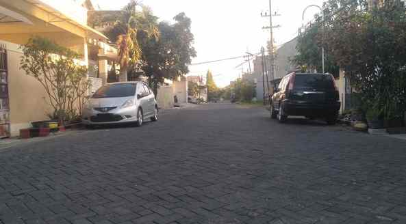 dijual rumah raya wiguna tengah