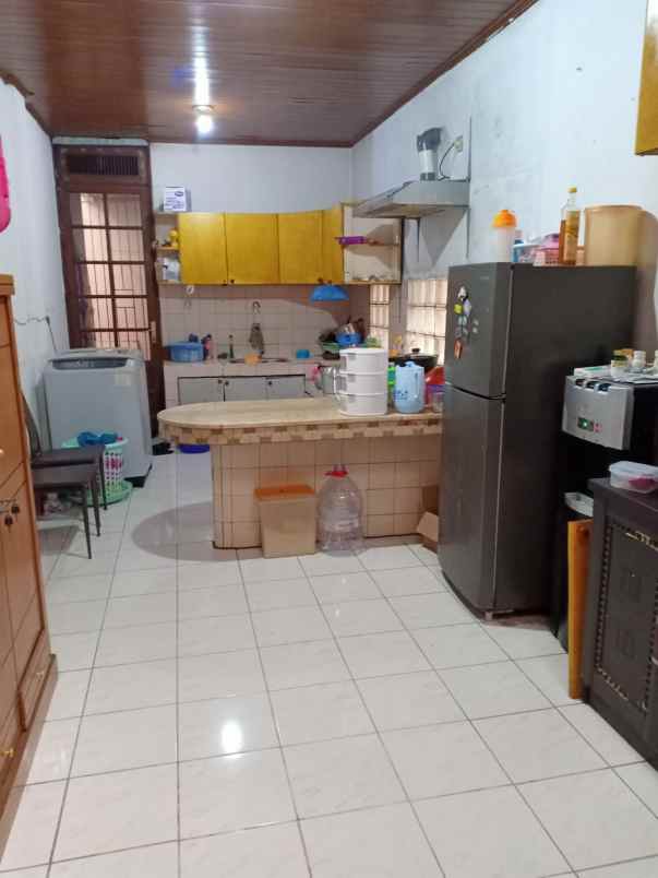 dijual rumah 2 lantai mewah arsitektur motif kayu jati