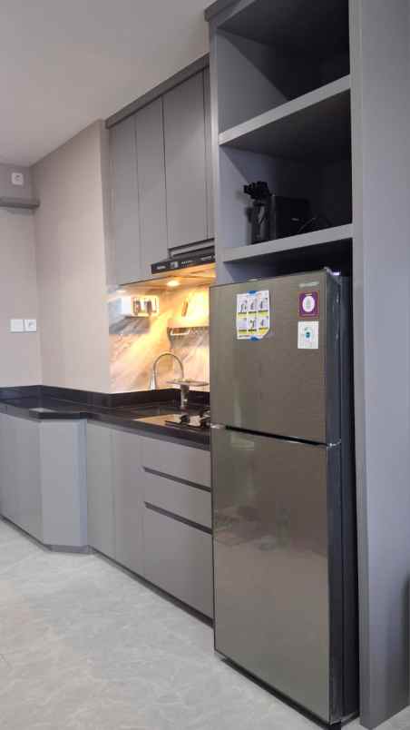 dijual rumah bella pakuwon city