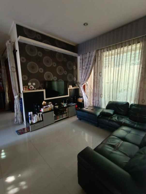 dijual rumah cluster puri suryalaya