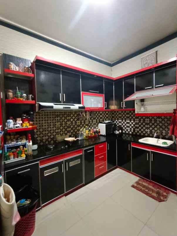 dijual rumah cluster puri suryalaya