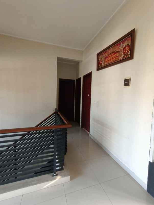 dijual rumah cluster puri suryalaya