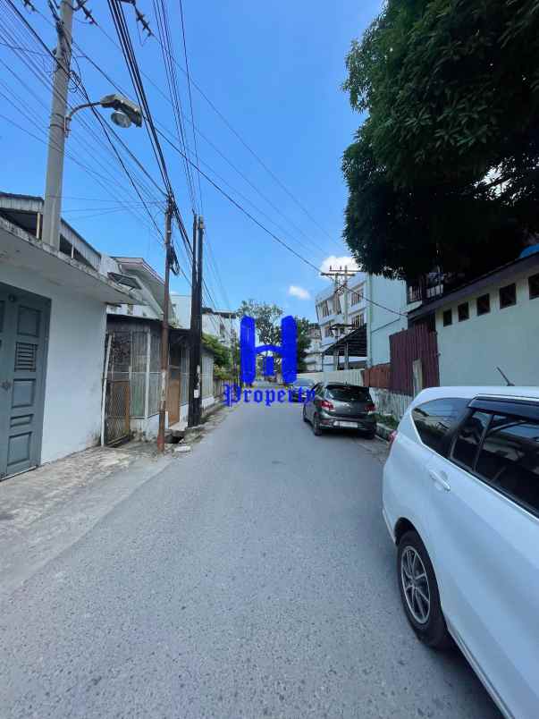 dijual rumah di jalan harimau madong lubis medan