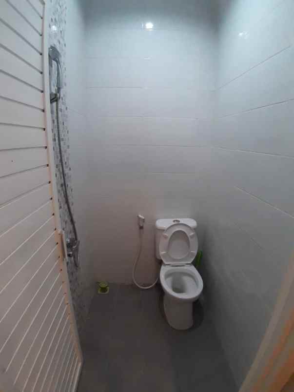 dijual rumah jl abdul gani atas