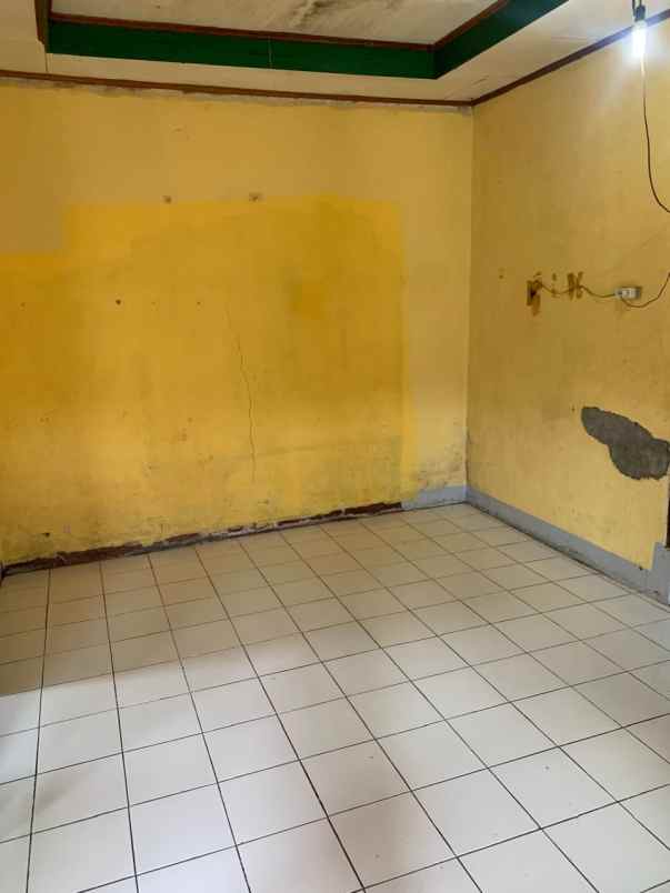 dijual rumah jl raya cinanggela samping