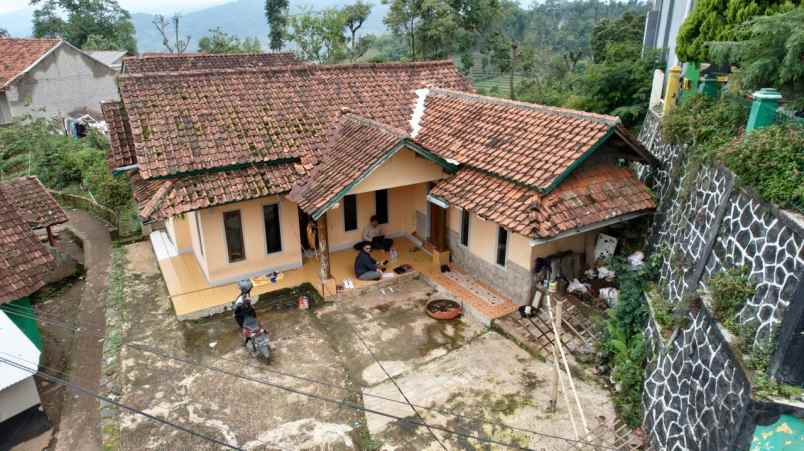 dijual rumah jl raya cinanggela samping