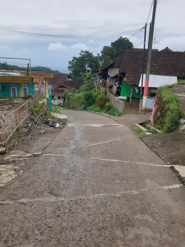 dijual rumah jl raya cinanggela samping