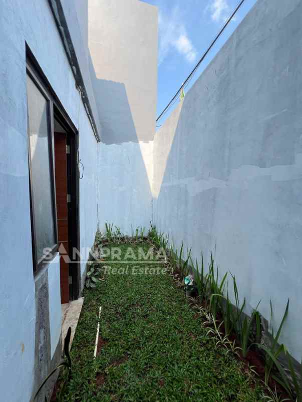 dijual rumah jln raya harjamukti
