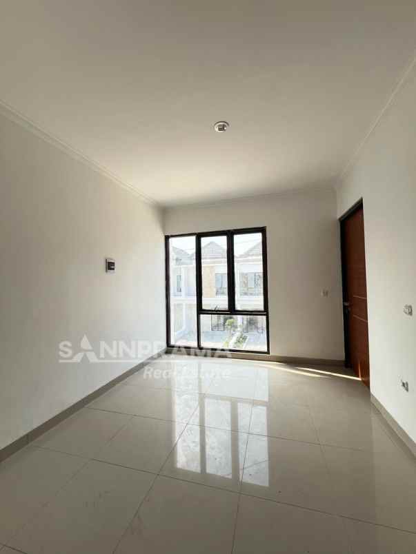 dijual rumah jln raya harjamukti