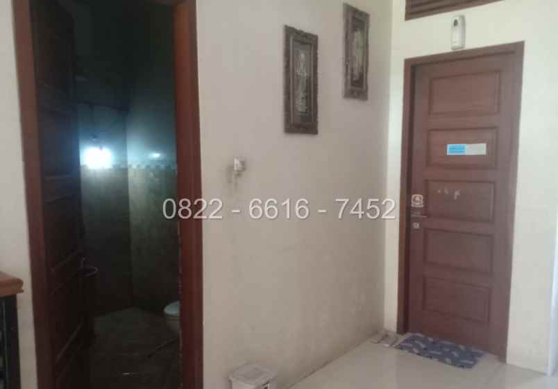 dijual rumah komplek sariwangi