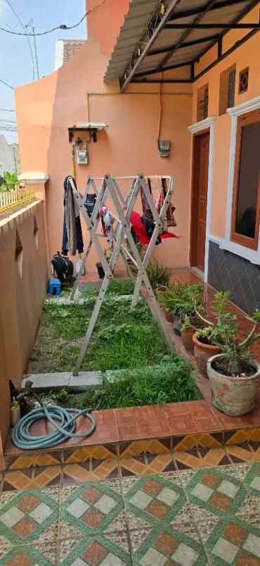 dijual rumah perum rawalumbu jembatan 7