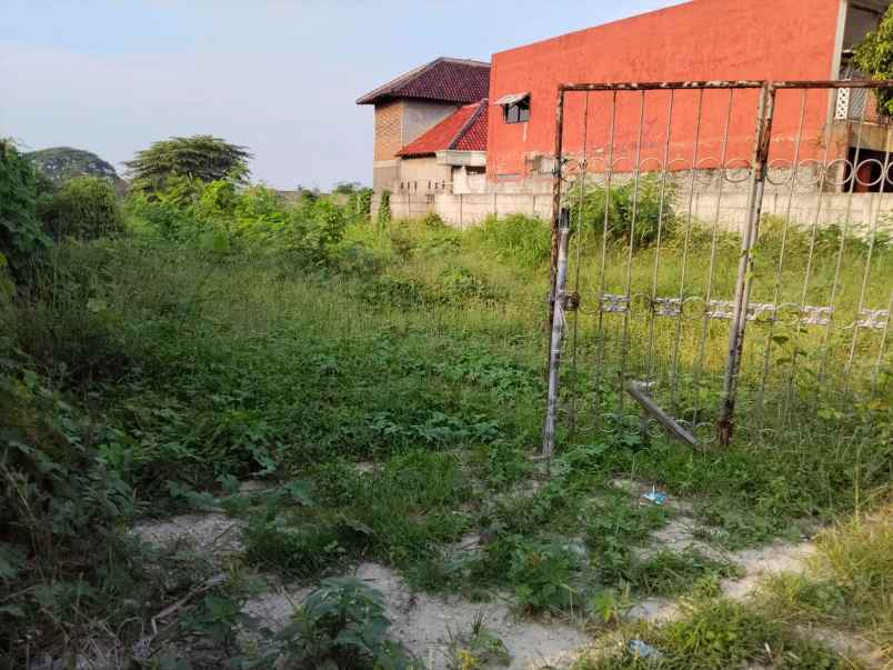 dijual tanah kosong jl raya kampung melayu tangerang