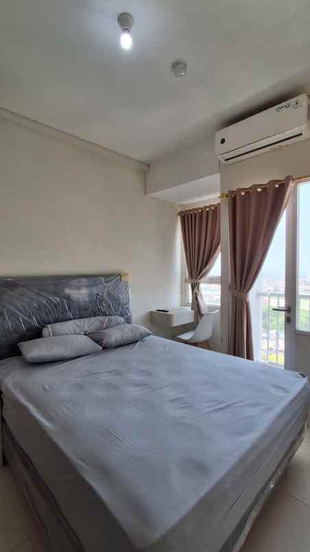 disewakan apartemen jalan caman raya no 21
