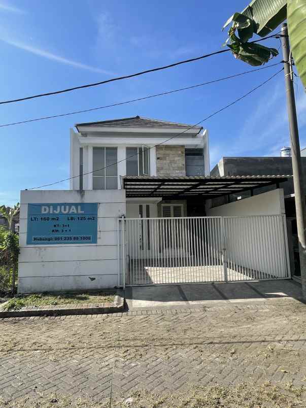 rumah 2 lantai semi furnished siap huni di tenggilis