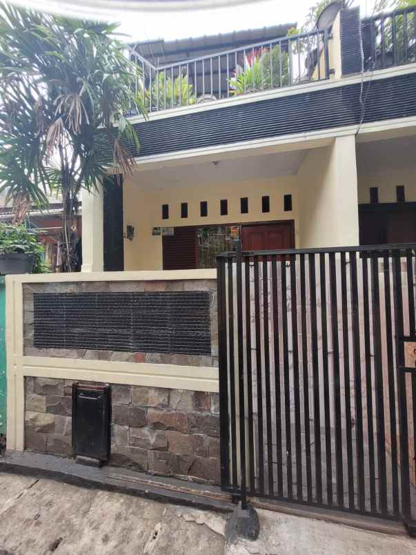 rumah di kontrakan bu hj entin