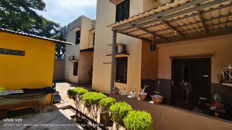 dijual rumah citra grand blok e