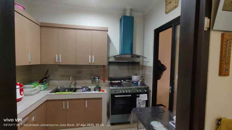 dijual rumah citra grand blok e