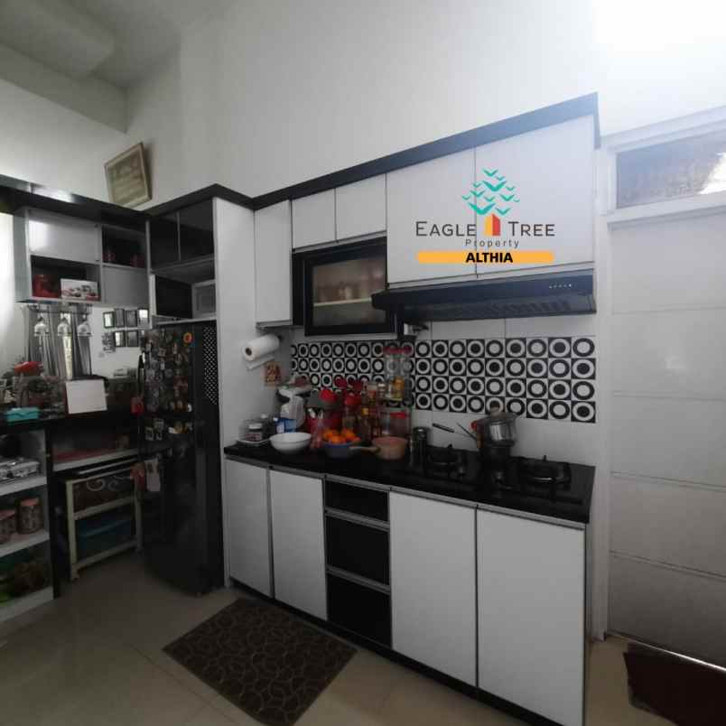 dijual rumah graha raya