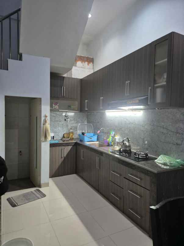 dijual rumah jalan tuasan komplek