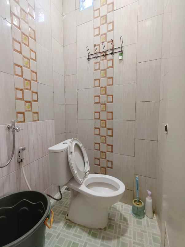 dijual rumah kampung tengah