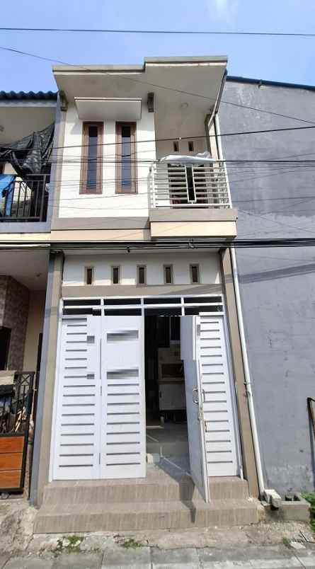 dijual rumah karang empat