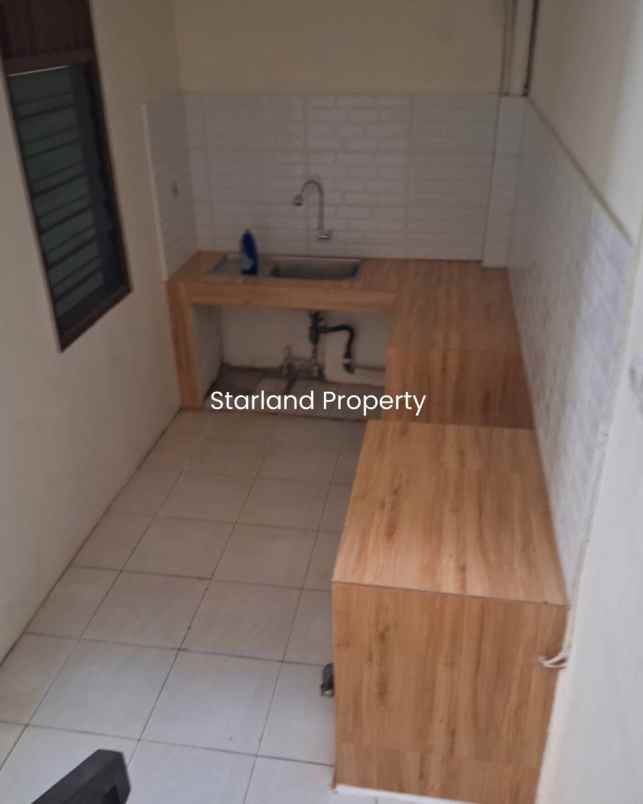 dijual rumah komplek deplu pondok aren