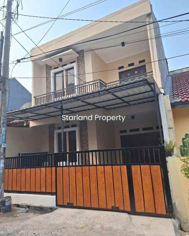 dijual rumah komplek deplu pondok aren