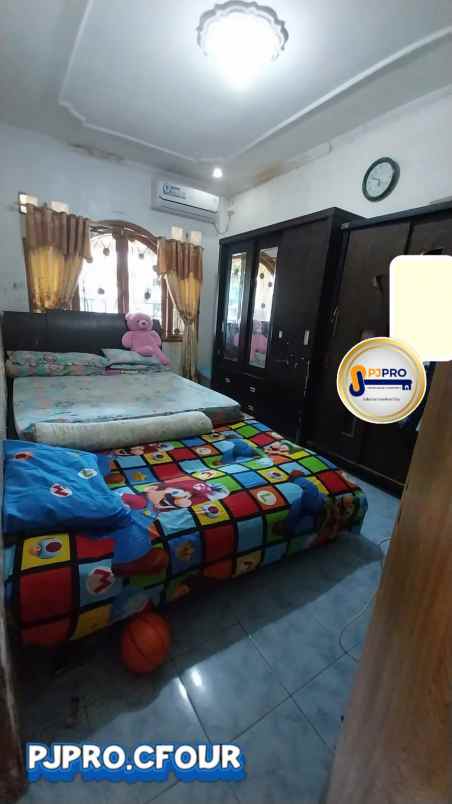 dijual rumah villa mutiara gading 1