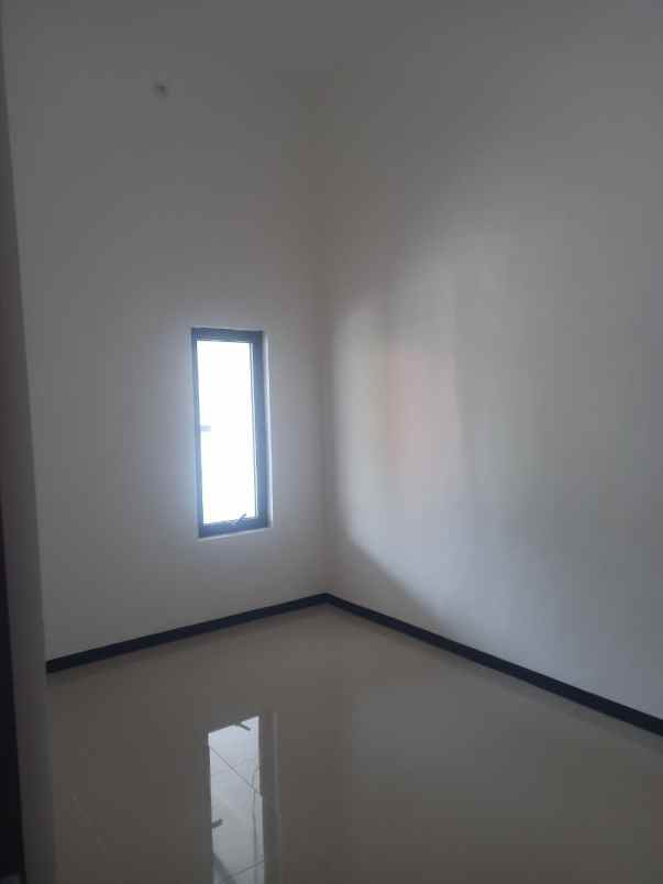 dijual rumah wiguna