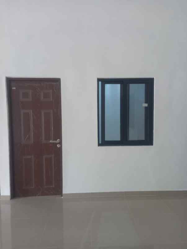 dijual rumah wiguna