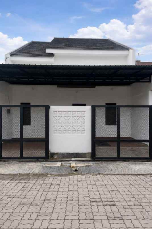 dijual rumah wiguna