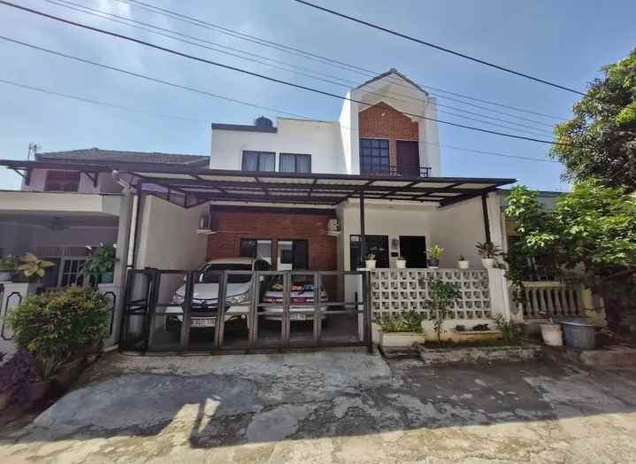 rumah 2lt dalam perumahan kawasan ciherang tapos depok