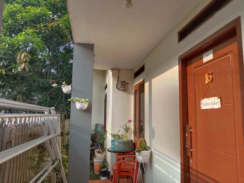 rumah belakang kampus jgu dekat grand depok city