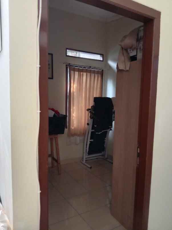 rumah belakang kampus jgu dekat grand depok city