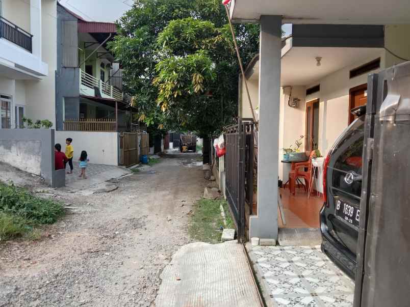 rumah belakang kampus jgu dekat grand depok city