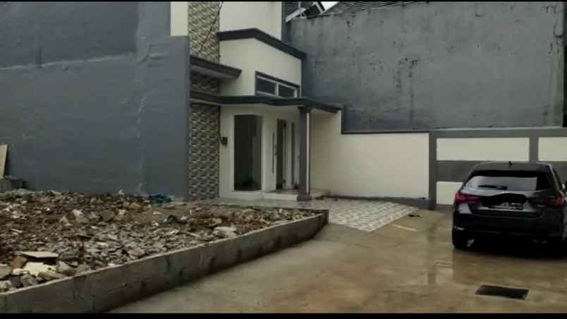 rumah jln haji r sanim tanah