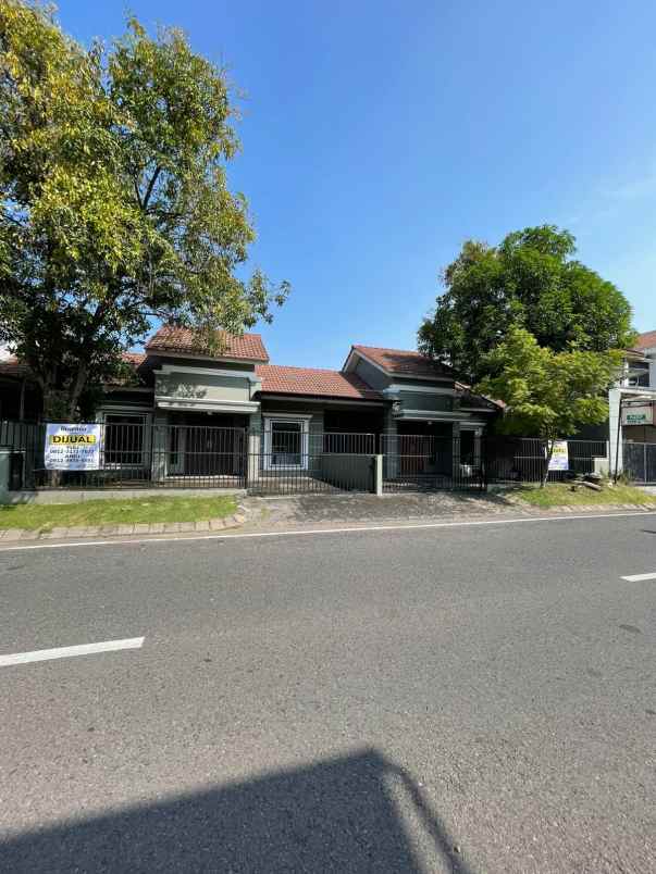 2 rumah jejer puri surya jaya jalan raya boulevard