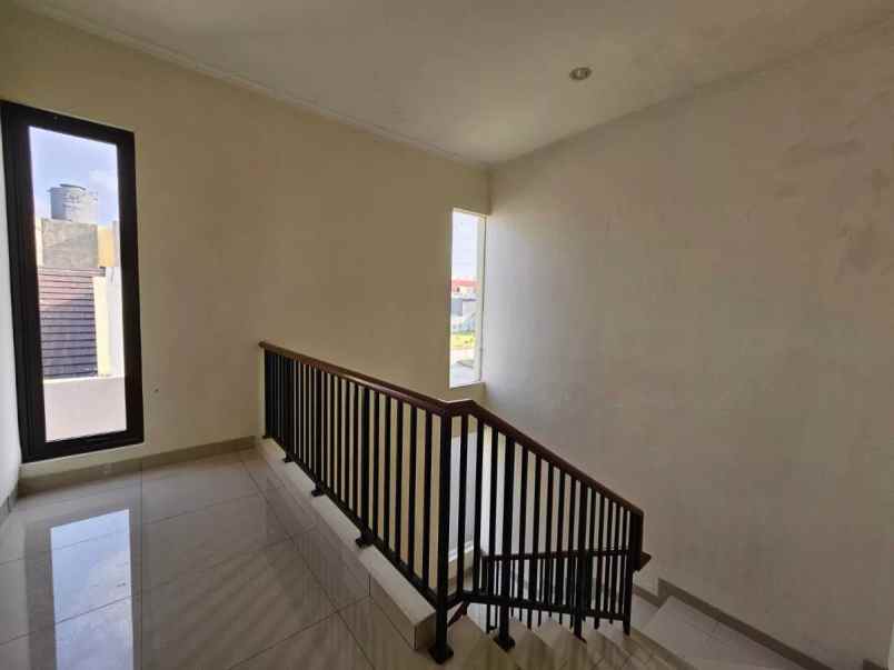 dijual rumah cluster arana harapan indah