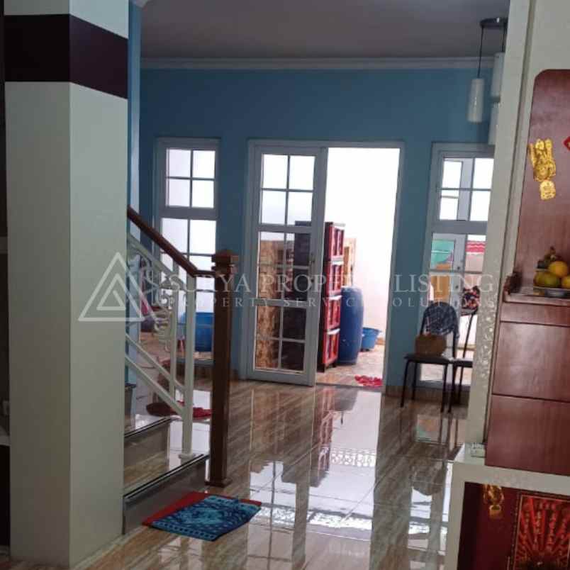 dijual rumah jalan graha metropolitan
