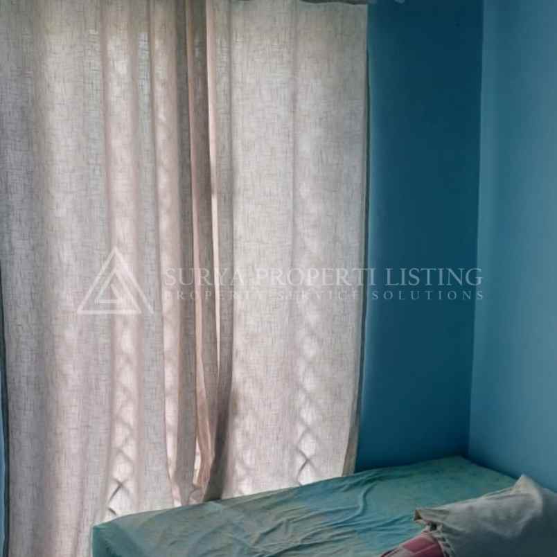 dijual rumah jalan graha metropolitan