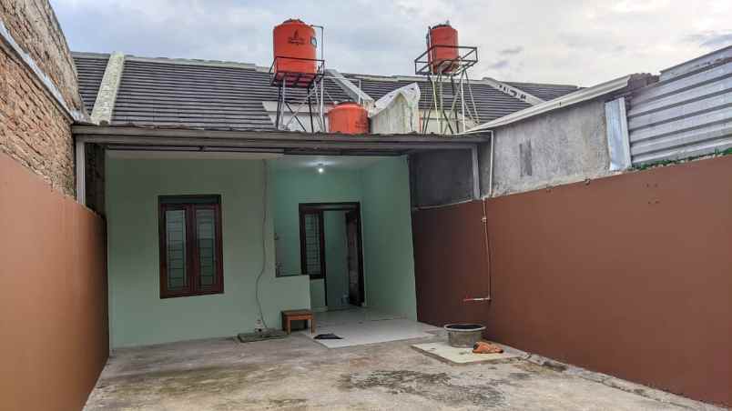 dijual rumah jl houkeri cisaranten
