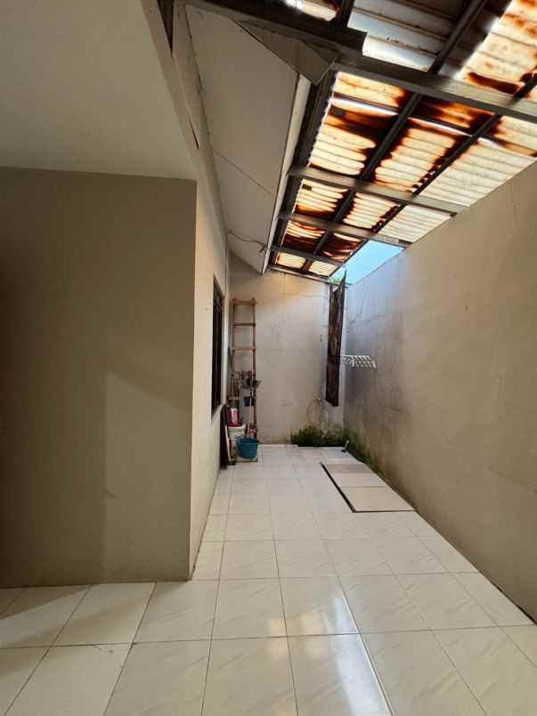 dijual rumah jl raya gading tutuka