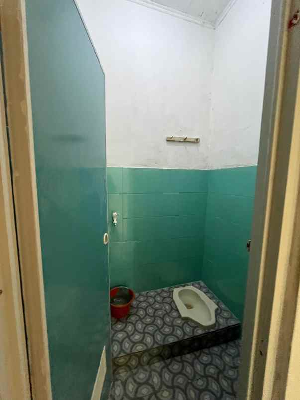 dijual rumah jl raya raden sanim