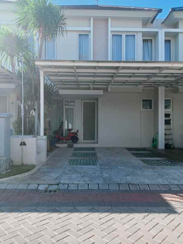 dijual rumah pakuwon city grand island