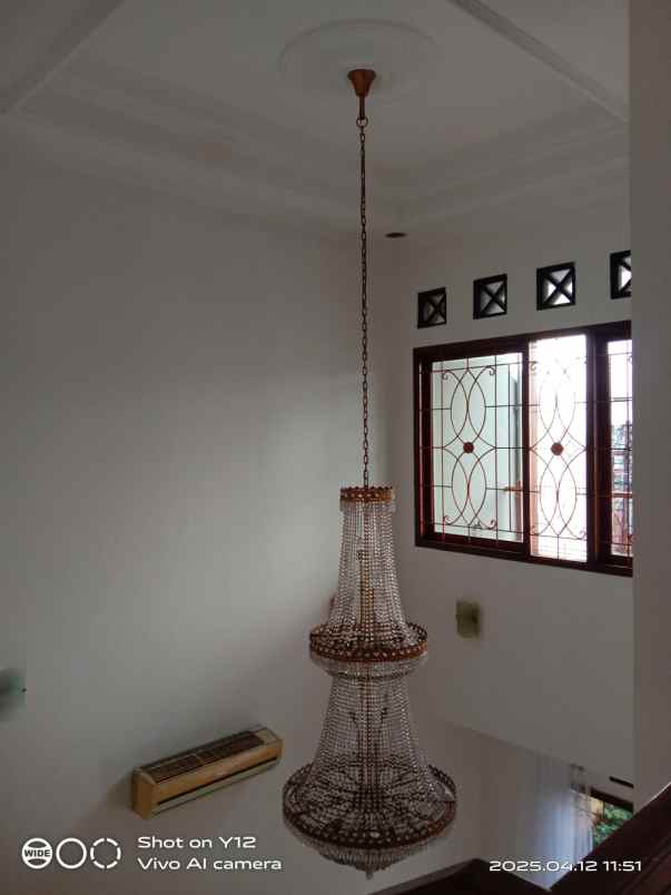 disewakan rumah kayu putih